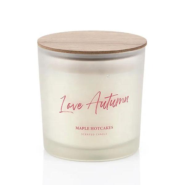 scented candle in glass holder